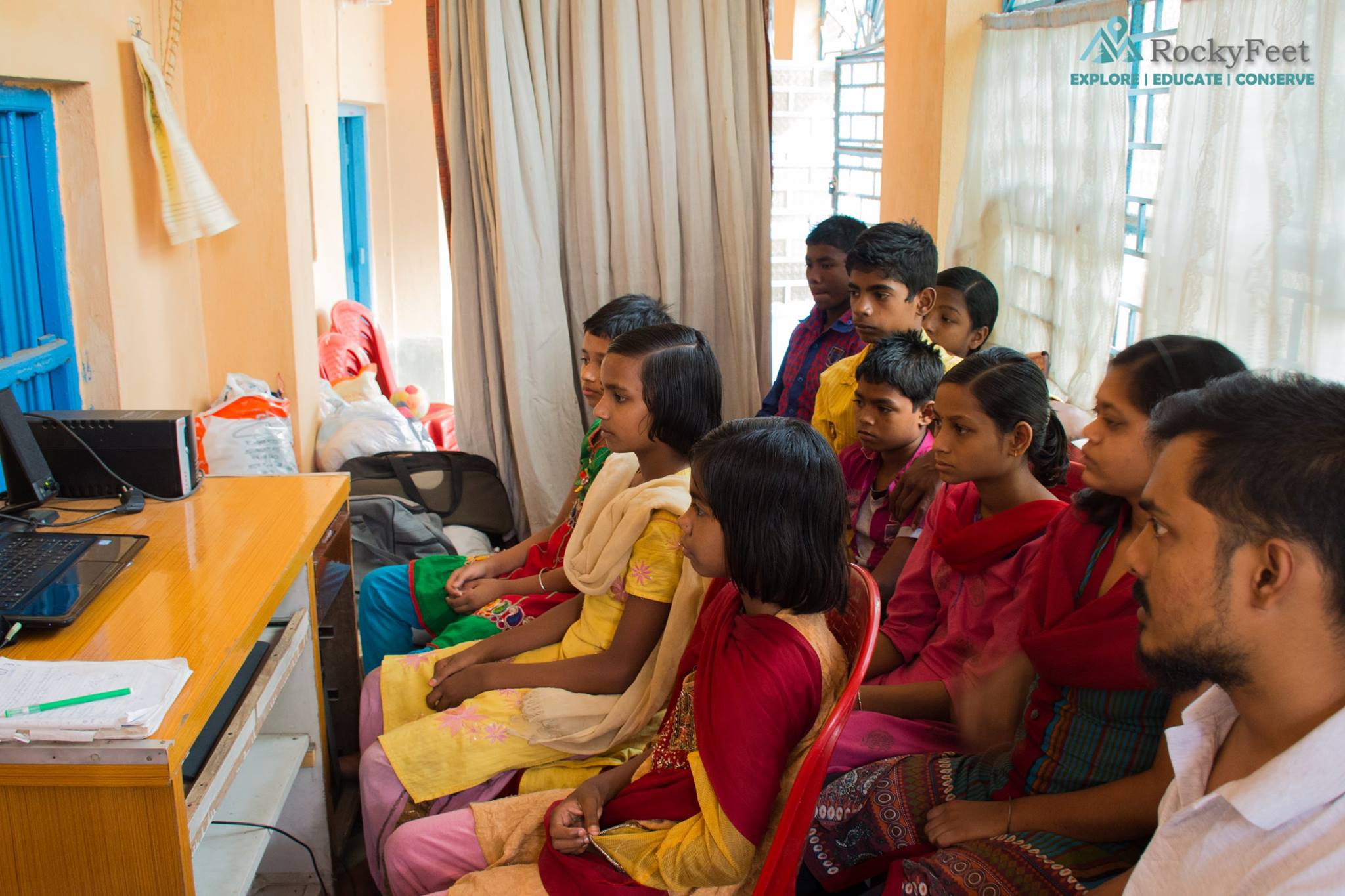 Children in deep speculation, watching BBC Earth Flight documentary