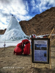 Ice stupa in front of 